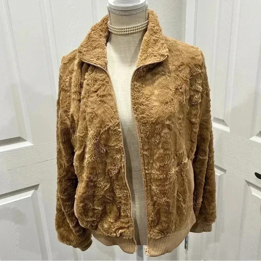 New Directions zip front faux fur tan jacket with elastic waist and cuffs